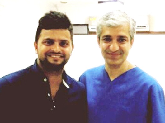 Picture of Dr. giroti and Suresh Raina India cricketer